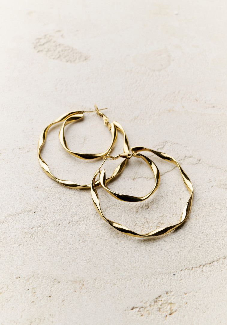 Boucles d'oreilles Créoles torsadées dorées - Élégance intemporelle